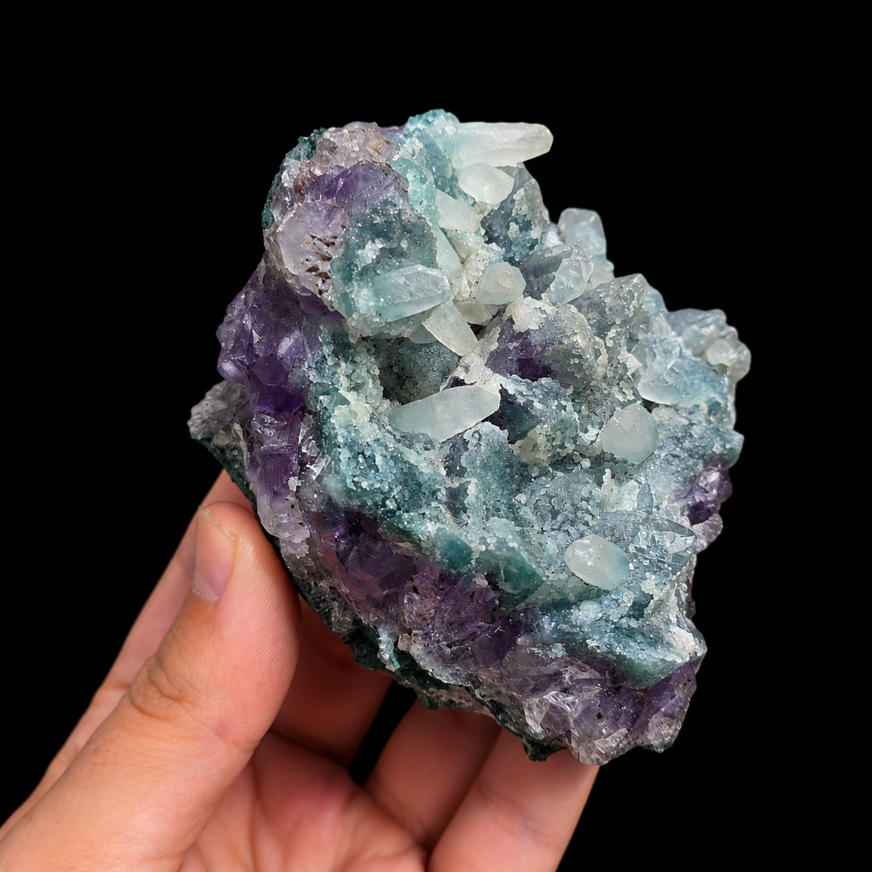 Amethyst with Manganocalcite cluster angled front detail, showing UV reactive pale crystals and natural purple amethyst formations