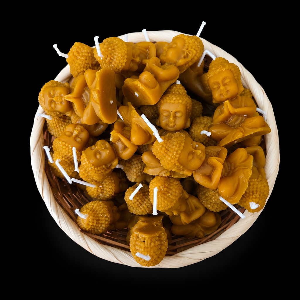 Handmade Buddha beeswax honey candles arranged in a woven basket, with warm golden colour and artisan finish