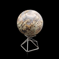 Slightly rotated front view of a polished moss agate sphere 460g showing pale green, beige and translucent natural inclusions