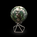 Front view of a polished moss agate sphere 410g with deep green inclusions, natural cavities and creamy white areas on a metal stand