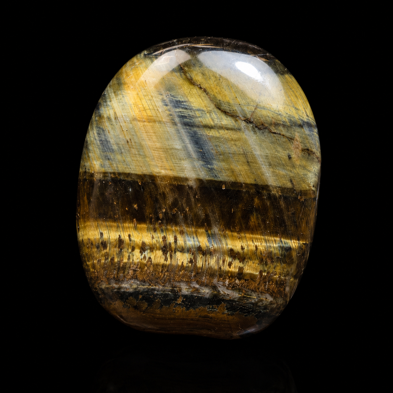 Polished Mixed Tiger’s Eye and Hawk’s Eye palm stone, close-up detail view showing golden, brown and blue-grey banding with glossy finish