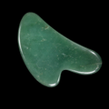 Polished green aventurine Gua Sha tool, front angled view showing smooth curved massage shape and natural green mottling.