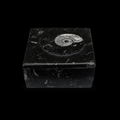 Front view of square fossil jasper jewellery box with ammonite fossil detail on the lid