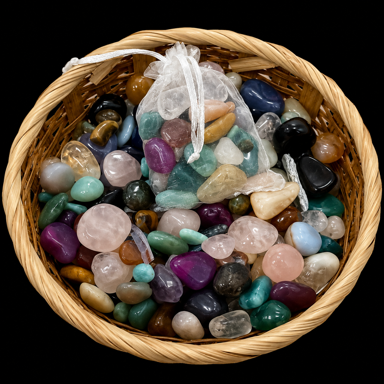 Top view of a mixed minerals tumbled stones bag with assorted polished natural stones displayed in a basket | HeyMiner