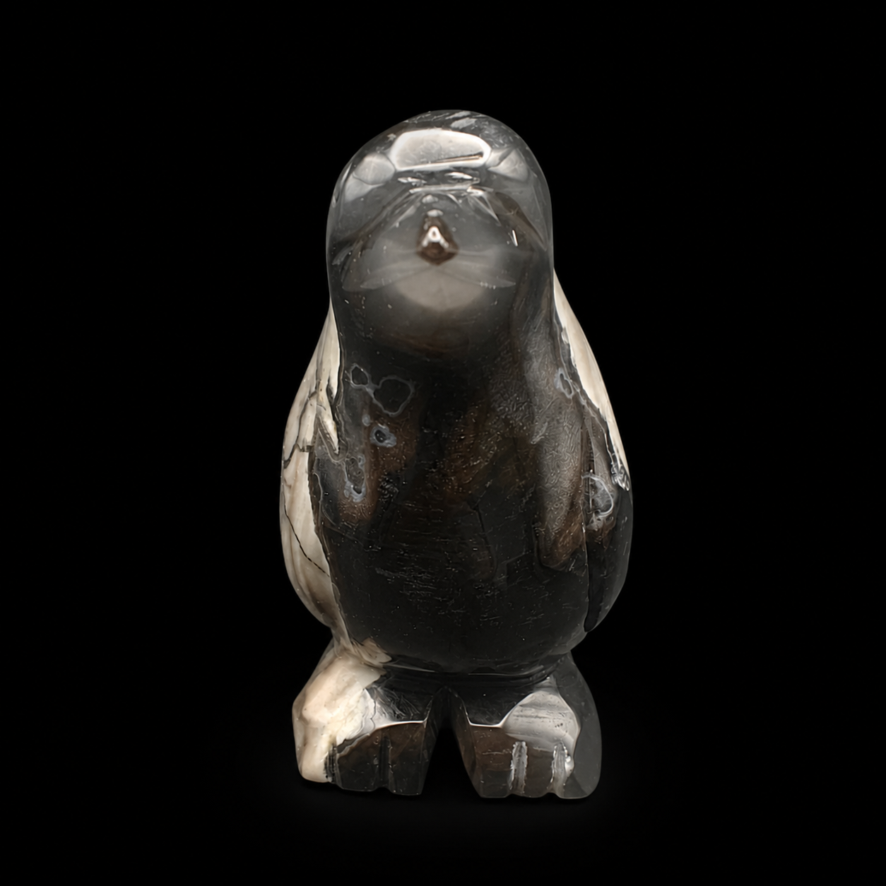 UV reactive volcanic agate penguin carving 533g front view, black and cream marbled polished agate figure, exact unique piece