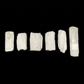 High-quality raw selenite specimens with natural fibrous texture and pearly white colour, displayed on a neutral background